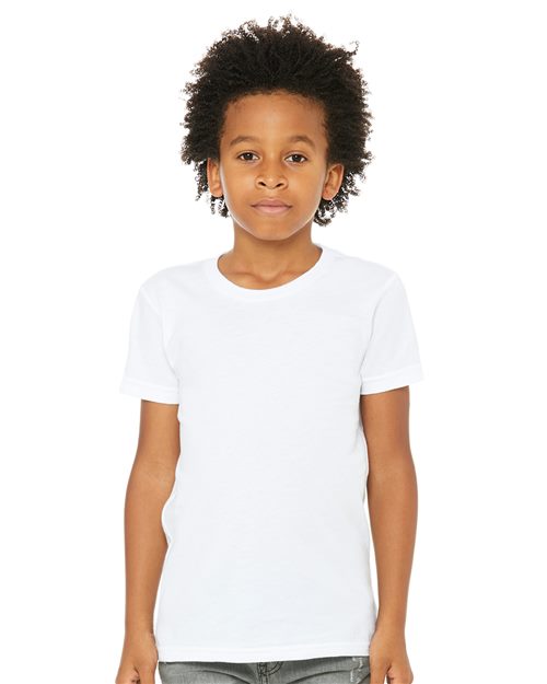 Load image into Gallery viewer, A young child with curly hair is wearing the BELLA + CANVAS Youth Jersey Tee, made from soft Airlume combed cotton, and gray pants against a white background, showcasing the comfort and style of unisex sizing.