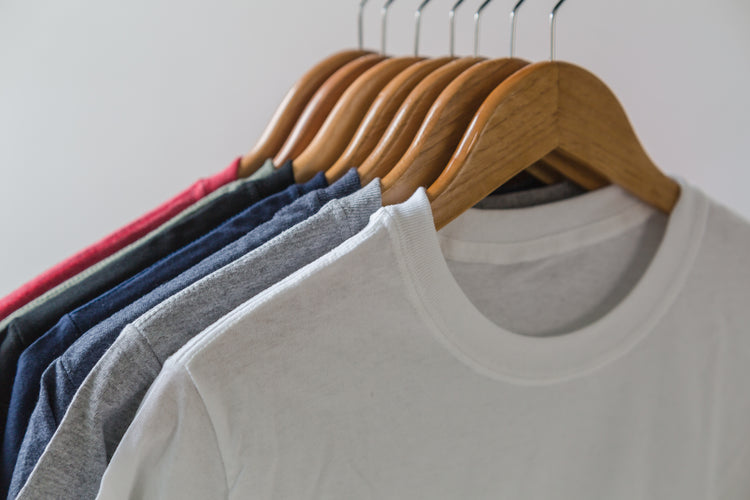 Multicolor t shirts on hangars
