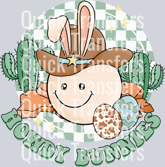The Adorable Western Cowboy Easter Howdy Bunnies DTF Transfer by Quick Transfers features a smiling bunny in a cowboy hat and bunny ears, surrounded by cacti, eggs, and carrots with