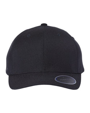 A plain black Flexfit - NU® Cap is centered against a white background, highlighting the Flexfit® style with six panels and a slightly curved brim. The front is simple with no logos, while a small sticker on the brim's edge emphasizes its Cool & Dry Technology.