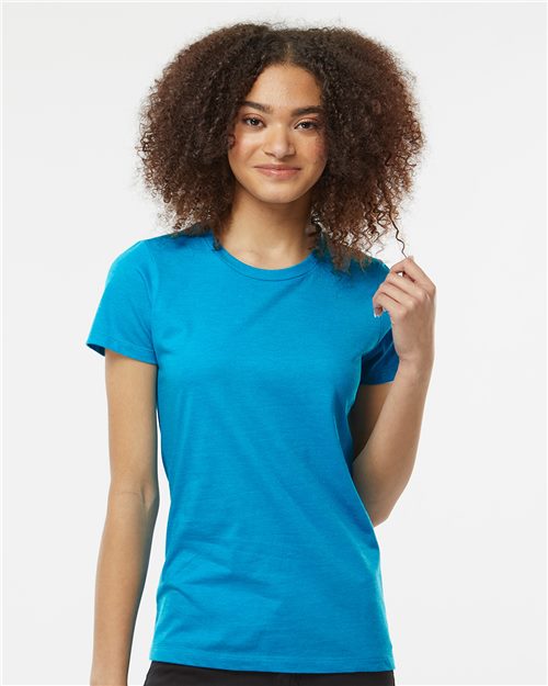 Load image into Gallery viewer, A person with curly hair smiles, wearing a Tultex Women&#39;s Premium Cotton Blend T-Shirt in bright blue, against a plain white background, highlighting its blend of comfort and quality.
