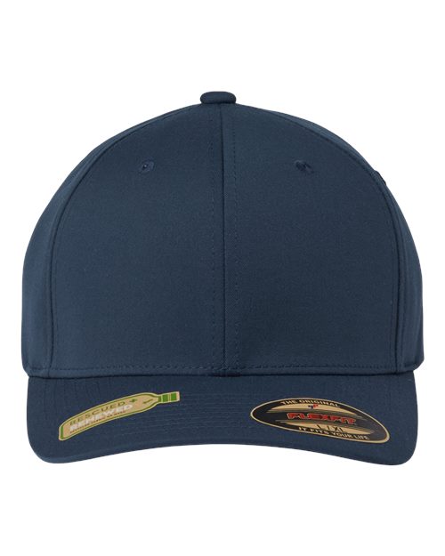 Load image into Gallery viewer, Front view of the Flexfit - Sustainable Polyester Cap by Flexfit in navy blue, showcasing a rounded crown and permacurv visor. Two logo stickers adorn the brim, made with sustainable materials. It stands out against a plain white background.
