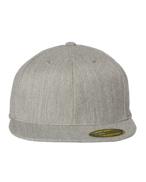 The Flexfit - 210® Flat Bill Cap by Flexfit is a gray snapback with a flat brim and high-profile design. Its textured fabric adds to its casual appeal, while a small, round sticker on the brim enhances its front view.