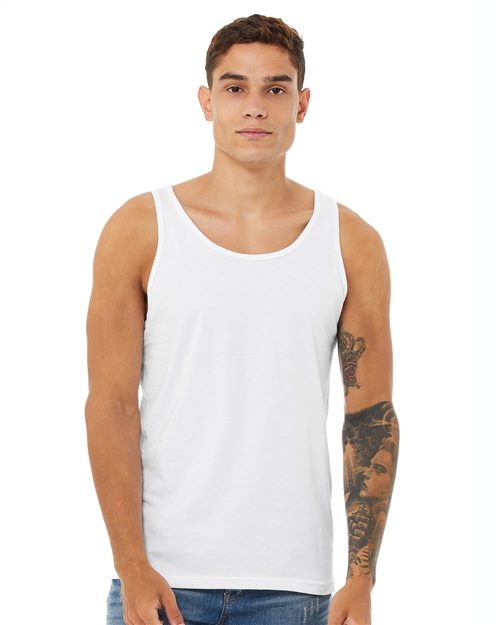 Load image into Gallery viewer, A person with short brown hair wears a BELLA + CANVAS Jersey Tank in plain white, made from soft Airlume cotton, paired with blue jeans. A tattoo on one arm adds personal style. The plain white background highlights the casual elegance and effortless fit of the unisex sizing.
