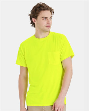 Wearing a vibrant yellow Hanes - Workwear Pocket T-Shirt made from recycled polyester, the person looks sideways against a plain white backdrop. This shirt features a practical chest pocket and is crafted with sustainable manufacturing practices.