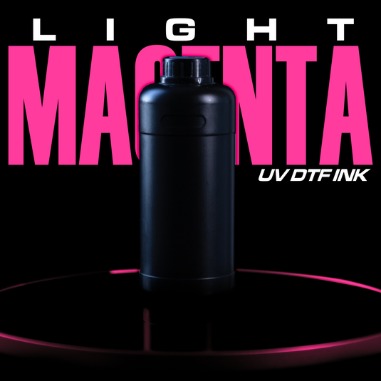 A black bottle of DTF Locker's "UV DTF Ink - Light Magenta" sits against a black backdrop. Bold pink text reading "Light Magenta" contrasts sharply with the background, while precision printing is highlighted by a pink light illuminating the bottle's base and text.