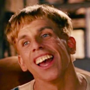 A man laughs with his mouth open while wearing the test123 by Quick Transfers.
