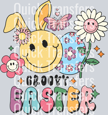 The Groovy Easter Bunny Vibrant Floral Egg DTF Transfer by Quick Transfers features a yellow bunny face, flowers, pastel egg, and butterfly with 
