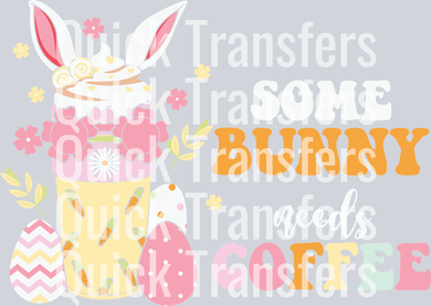The Some Bunny Needs Coffee Adorable Pastel Easter DTF Transfer by Quick Transfers features a pastel coffee cup with bunny ears, whipped cream, Easter eggs, and flowers. The text reads 