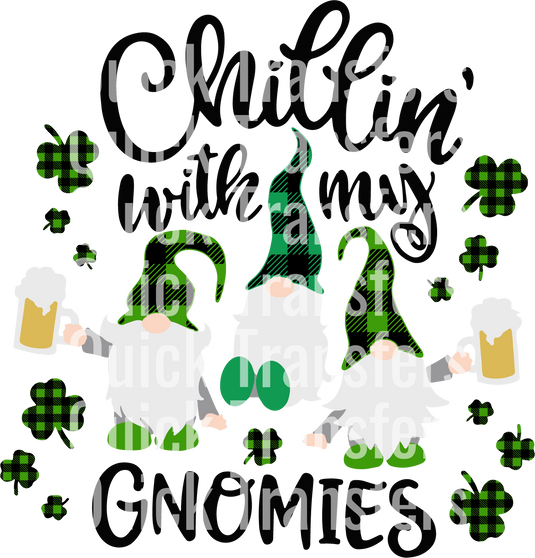 The "Chillin With My Gnomies St Patricks Day Design" from Quick Transfers features two gnomes in green hats with beer mugs amid shamrocks. It has a festive feel, perfect for the holiday, with "Quick Transfers" patterned in black text over the scene.