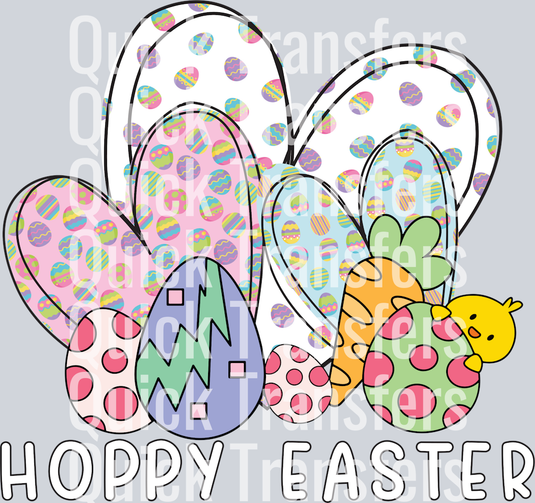 The Quick Transfers Vibrant Hoppy Easter Eggs With Chick And Carrot Transfer features colorful eggs, bunny ears, a carrot, and a yellow chick peeking from behind an egg with 