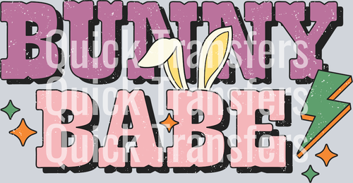 The Bunny Babe Retro Easter Vibrant Lightning DTF Transfer by Quick Transfers features pink and black text with bunny ears—perfect for Easter designs. Ideal for custom apparel using DTF transfers and a heat press.