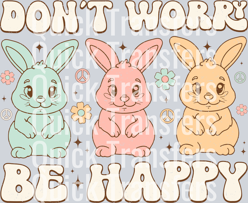 The Premium Dont Worry Be Happy Pastel Bunny Trio Transfer by Quick Transfers features blue, pink, and yellow cartoon bunnies with flowers and peace signs plus bold 