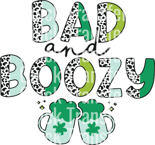 The image showcases the "Bad And Boozy St Patricks Day Design - Ready To Press DTF Transfer" by Quick Transfers, featuring "BAD" and "BOOZY" in green, with leopard print on "BAD", clinking mugs under "BOOZY", and repeated white text saying "Quick Transfers.