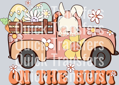 The Adorable Easter Bunny Truck With Eggs And Flowers Transfer by Quick Transfers features a cartoon bunny in a pink truck bed with eggs and flowers, plus a floral 