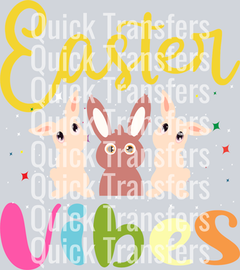 The Vibrant Easter Vibes Bunnies Design Ready To Press Transfer by Quick Transfers features three cute cartoon bunnies under colorful 