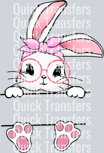 The Cute Easter Peekaboo Bunny With Pink Bow Glasses Transfer by Quick Transfers features a white bunny with pink ears, bow, and glasses peeking over a line—perfect for Easter apparel and holiday DTF transfers. Pink paw pads and feet complete the charming design.