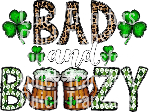 The "Bad and Boozy St Patricks Day Shamrock Beer Design - Ready To Press DTF Transfer" by Quick Transfers features the phrase "Bad and Boozy" with a leopard print for "Bad," green clovers, and beer mugs in "Boozy," incorporating the brand name throughout.