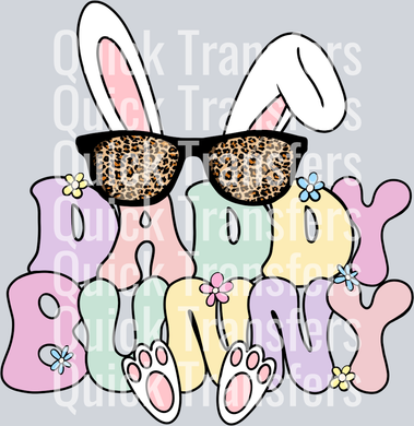 The Adorable Hoppy Bunny With Leopard Sunglasses Easter Transfer by Quick Transfers features pastel “Bunny” lettering with floral decor, bunny ears, and leopard sunglasses—ideal for Ready To Press projects and Custom DTF Transfers.