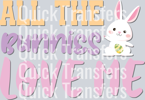The Quick Transfers All The Bunnies Love Me Adorable Bunny DTF Transfer features bold lettering and a cute bunny with an egg—ideal for custom apparel using your heat press.